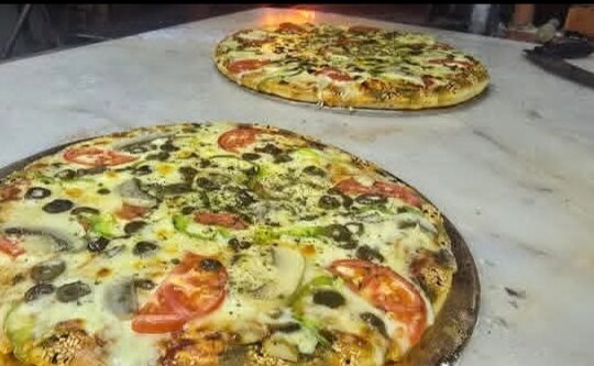 بيتزا ومعجنات بابا روتي